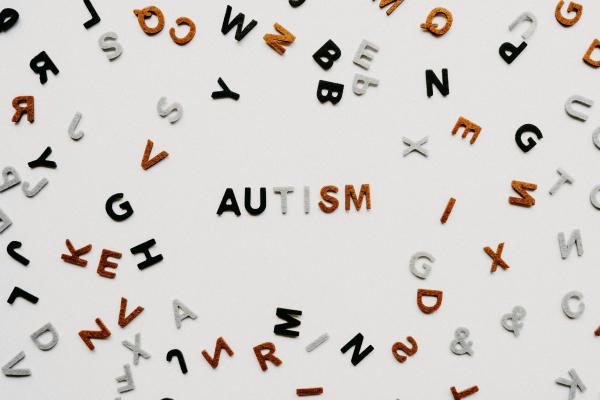the word autism spelt out in felt letters