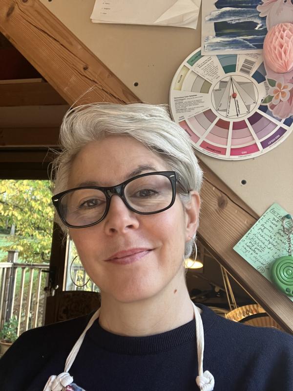 Jo smiles at the camera.